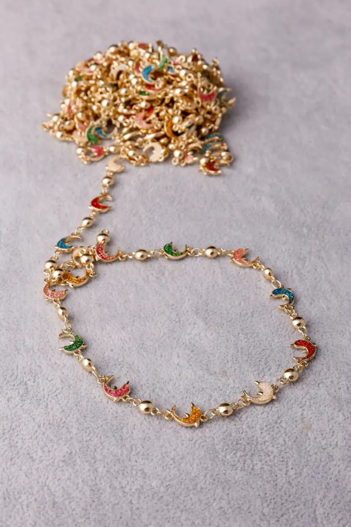 Dolphin chain off white and coloured -gold plated