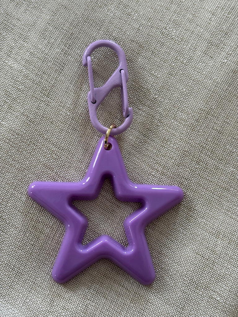 Purple star charm