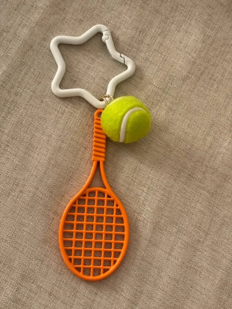 Orange tennis charm