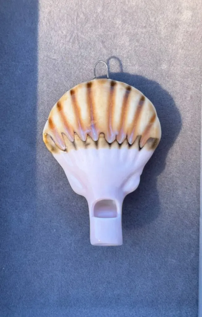 Pink and brown shell charm