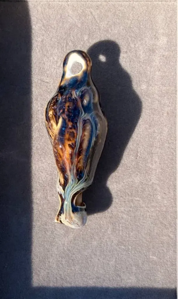 Brown seashell charm