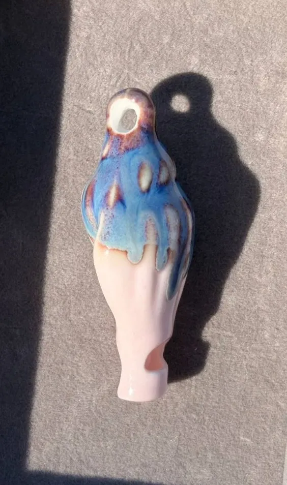 Pink and blue seashell charm