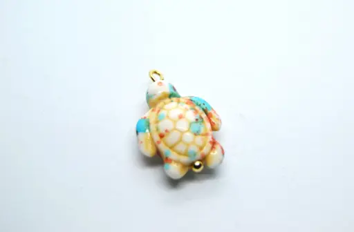 Coloured stone turtle charm