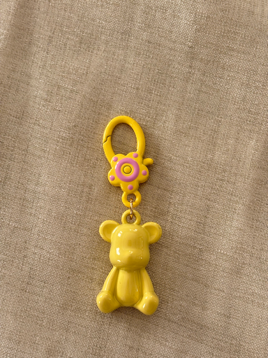 Small yellow teddy charm